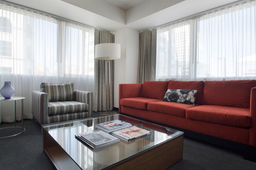Hotel Murano Tacoma Exteriör bild A living room at the hotel